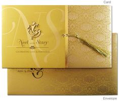 two wedding cards, one in gold and the other in white with a tassel