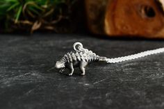 Ankylosaurus Dinosaur Jewelry Prehistoric Science Dino Jewelry Dino Animal Kids School Gift 925 Sterling Silver This one is a gorgeous and realistic ankylosaurus necklace in solid 925 sterling silver. Unisex both for him and for her. Would make a perfect distinctive gift for someone special! >Material: 925 Solid Sterling Silver >Pendant measurement approx.: 10 x 10 x 21.5mm >Please select your preferred 925 sterling silver chain (Style 1 and Style 2) or black leather cord (Style 3) from the drop Dino Accessories, Dino Jewelry, Dinosaur Accessories, Dinosaur Stuff, Kids School Gifts, Feathered Dinosaurs, Dinosaur Jewelry, Halloween Potion Bottles, Silver Chain Style