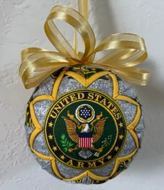 an ornament with the seal of the united states is hanging on a wall