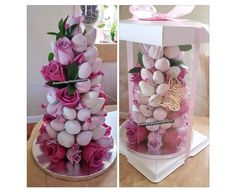 a box with pink roses and white eggs in the shape of a tree on top