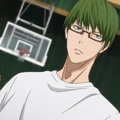 a man with green hair and glasses standing in front of a basketball hoop