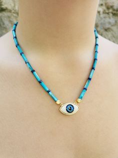 ✨ Minimalist beaded gemstone eye necklaces that are simple and elegant suit any outfit. ✨ Necklaces are made of hematite (black and white) and nacre (blue) gemstones which are believed to affect people. ✨ The eye is ceramic, and the eye holder is 24K gold-plated brass. ✨The materials used are first quality. The blue one is not available but can be made in a week on order. ✨ 100% satisfaction guarantee; Return it within 14 days if you feel unsatisfied. ✨ Please don't hesitate to get in touch with Beaded Eye, Black And White Necklaces, Elegant Suit, Hematite Stone, Unique Necklace, Jewelry Unique, Blue Necklace, Necklaces For Women, Eye Jewelry