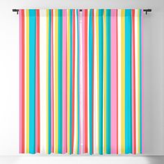 colorful striped curtains hanging on the wall