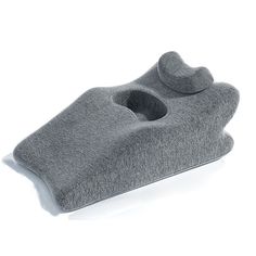 an object made out of felt sitting on top of a white surface