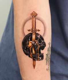 tattoo sword and skull - Google Search Skull And Dagger Tattoo, Gold Tattoo Ink, Gold Tattoo, Tattoo For Son, Back Tattoos For Guys, Dagger Tattoo, Tattoo Meaning, Black Ink Tattoos, Back Tattoos