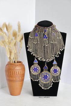 Afghan Jewellery Authentic Traditional Handmade Jewellery. Get in contact with us if there is any queries regarding the item. Check out my page for other items. Help my small business and promote Afghan culture by placing an order with us. We have different kinds and types of Afghan Vintage Jewelleries! Your feedback is much appreciated. Please let us know the item arrived safely! Bohemian Jewelry Set With Chandbali Latkans, Bohemian Latkans Chandbali Jewelry Sets, Afghani Jewelry, Afghan Jewellery, Blue Afghan, Afghan Culture, Afghan Wedding, Kuchi Jewelry, Afghan Jewelry