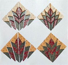 four quilts are arranged in the shape of flowers and leaves, each with different colors