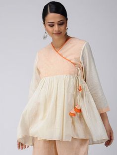 Short Frock Kurti With Jeans, Angrakha Top With Jeans, Navratri Bollywood Style Tunic Kurta, Cotton Tunic Dress For Navratri, Angrakha Style Coord Set, Angrakha Style Short Frock, Short Angrakha Style Frock Pakistani, Angrakha Crop Top, Angrakha Peplum Top