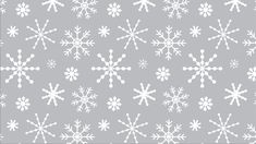 white snowflakes on grey background