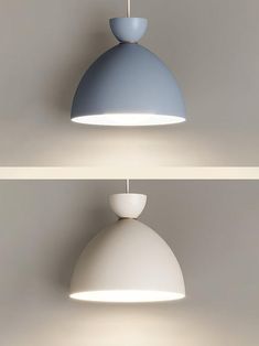 two white and blue lights hanging from the ceiling