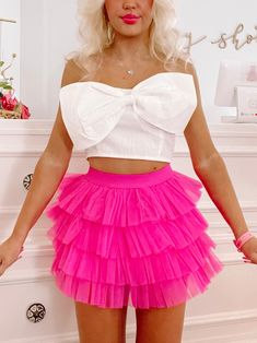 The Trixie Tulle Skirt from Sassy Shortcake is a tiered ruffle bright pink tulle skort. She features an elastic waistband. Lined. Model wearing a size small. content: 100% polyester Mini Tulle Skirt, Hot Pink Skirts, Sparkle Romper, Sassy Shortcake, Tulle Skirts Outfit, Feather Gown, Rush Outfits, Recruitment Outfits, Fancy Fits