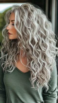 Curly Hairstyles for Women Over 50 Grey Blonde Curly Hair, Long Layered Hair For Curly Hair, Natural Grey Curly Hair, Long Gray Hair Over 40, Long Layered Grey Hair Over 50, Long Curly Hair Styles With Bangs, Big Blonde Curly Hair, Long Gray Hair Over 60 Older Women, Long Curly Silver Hair