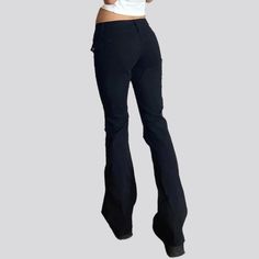 Introducing our 2023 Spring-Summer Collection ââ‚?double waistline black jeans ââ‚?the perfect blend of city vibe and monochrome elegance!Why They're Your Next Wardrobe EssentialThese low-waist. flare-leg jeans feature front seams with a unique double waistline. creating a look that is instantly eye-catching. The ultimate combination of contemporary design and classic style. these jeans are crafted with premium quality denim and a zipper & button closure for a sleek and resilient shape.Key Highl Black Y2k Style Bottoms With Five Pockets, Black Y2k Pants With Five Pockets, Trendy Black Straight Leg Flares, Black High Waist Y2k Jeans, Non-stretch Y2k Flare Jeans, Trendy Slim Fit Bottoms For Streetwear, Black Cotton Flare Jeans, Chic Black Cotton Flare Jeans, Black High Rise Flare Jeans