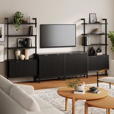 a living room filled with furniture and a flat screen tv mounted on the wall above it