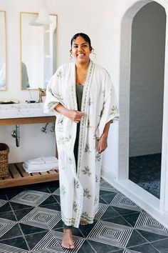 Handcrafted from sun-dried cotton, block printed by skilled artisans in India where they continue this heritage textile craft. Don the Lotus Bathrobe for mornings filled with grace and beauty, days of laid-back indulgence, and evenings of peace with lovely wide sleeves and a meditative green lotus patternâ€”you might just want to wear it all day. Lotus Block Print, Peaceful Green, Textile Craft, Chain Scarf, Candle Wall Decor, Lotus Design, Printed Robe, Beautiful Kimonos, Textile Crafts