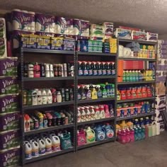 a store filled with lots of different types of detergents and bottles on shelves