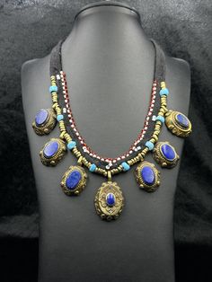 A Rare Vintage Boho Kuchi Banjara Tribal Afghan Handmade Beautiful Brass Necklace With Lapis Lazuli Stone. Necklace Length 20 Inches. Shipping Payment Feedback & Return Policy 1 : We ship Monday to Friday Via Airmail Register Insured  With Tracking # takes 2 to 4 Weeks to Destination. 2 : Contact us if you did not receive your item after 4 weeks. 3 : We Accept Payment From Most of the Mainstream Payment Methods. 4 : In Any Inconvenience Case we do Accept Return and full Refund. 5 : We Ship world Lapis Lazuli Stone, Brass Necklace, Vintage Boho, Lapis Lazuli, Necklace Lengths, Thailand, Beaded Necklace, Jewelry Necklaces, Brass