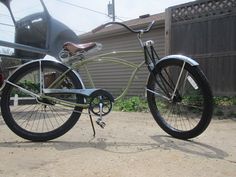 a bicycle parked in front of a house