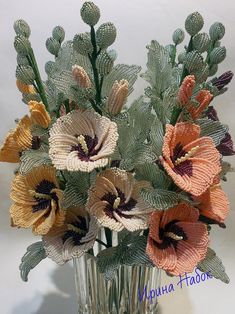 a vase filled with flowers on top of a table