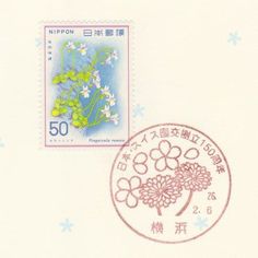 a stamp with an image of flowers and the word nippon on it in japanese writing