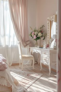 a bedroom with pink walls and curtains, a white dresser and chair in the foreground