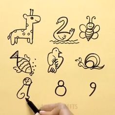 someone is drawing numbers on a piece of paper