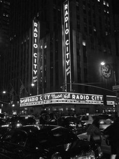 black and white photograph of radio city at night