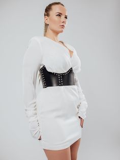 The model is wearing a size XL and is 33.5"/85 cm waist, 35"/89 cm underbust.Get ready to shine with the Westworld Corset! This stunning accessory delicately frames your waist and defines your curves, adding a touch of glamour to any outfit. Whether worn seamlessly over fitted garments or cinched in something more oversized, this corset is sure to turn heads. Corset Belts, Leather Corset Belt, Corset Belt, Leather Corset, Leather Harness, Burgundy Color, Burgundy Red, Leather Accessories, Brown Color