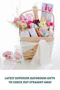 a basket filled with lots of different items on top of a white table next to a window