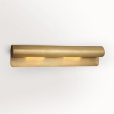 an image of a modern light fixture on the wall with dim lighting and no bulbs