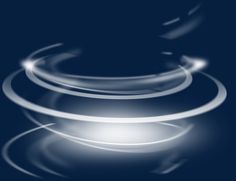 a blurry image of an object on a dark blue background with white circles around it