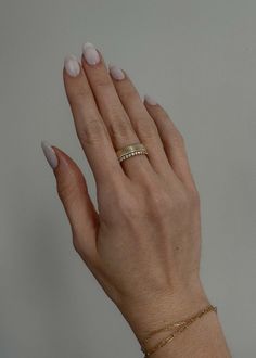 Part of our signature Solis collection—The Annabelle II is a modern ribbed ring, and makes the perfect wedding band, promise ring, or everyday piece. 14k solid gold—always Average weight: 5.5g Band width: 4.5mm Height off of finger: 2mm This piece cannot be resized This piece is made to order. Please allow at least 4-6 weeks for production. We offer custom sizes upon request. You can add custom or half sizes to your cart HERE. Please note that custom and half sized pieces are final sale. Simple Thick Gold Wedding Band, Textured Gold Wedding Band With Engagement Ring, Ribbed Wedding Band, Women’s Thick Gold Wedding Band, Gold Minimalist Thick Band, Ribbed Gold Wedding Band, Fall Rings, Ring Sizer, Gold Wedding Band