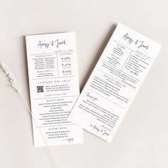 two wedding program cards sitting on top of each other