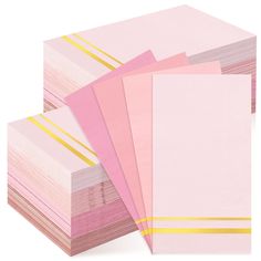 pink and yellow napkins stacked on top of each other