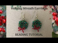 beaded christmas wreath earrings with red and green beads hanging from the earwires