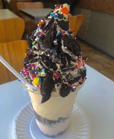 an ice cream sundae with sprinkles on top