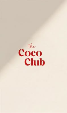 the coco club logo is shown in red on a white background with a shadow over it