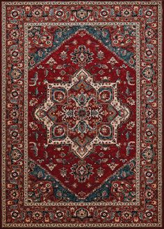 a red and blue rug with an intricate design on the center, surrounded by ornate borders