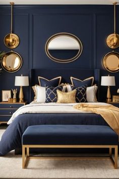 a bedroom with blue walls and gold accents