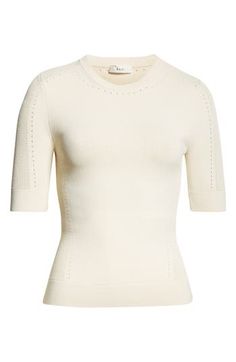 Intricate pointelle stitching defines the sleeves, neckline and sides of this ultrasoft top. Crewneck Short sleeves 63% viscose, 36% nylon, 1% elastane Dry clean Imported Fitted Pointelle Knit Sweater For Layering, Chic Cream Crew Neck Knit Top, Cream Fine Knit Crew Neck Top, Classic Beige Pointelle Knit Tops, Fitted Feminine Pointelle Knit Sweater, Fitted Classic Pointelle Knit Sweater, Elegant Pointelle Knit Tops For Fall, Elegant Pointelle Knit Fall Tops, Elegant Stretch Pointelle Knit Top