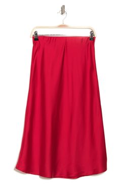 Elevate your wardrobe with this pull-on bias satin midi skirt for elegant, feminine style. 31" length (size S) Elasticized waist Pull-on style Satin construction 97% polyester, 3% spandex Machine wash cold, line dry Made in USA Model’s stats for sizing: 5’10” height, 34” bust, 27” waist, 35” hips. Model is wearing size S. Stretch Satin Lined Skirt, Stretch Flared Pencil Skirt, Red Satin Bottoms For Summer, Red Long Pencil Skirt For Spring, Red Satin Skirt For Formal Occasions, Stretch Satin Midi Skirt, Red Formal Skirt For Summer, Stretch Silk Midi Skirt, Silk Stretch Lined Skirt