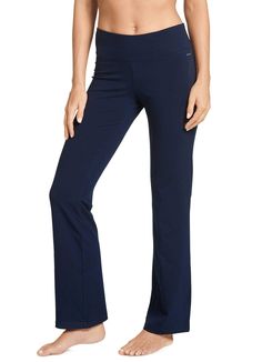 PRICES MAY VARY. Style 728516 Relaxed fit 31.5" inseam; Petite 29" inseam Black and Thunder Blue: 92% cotton/8% spandex; Charcoal Grey Heather: 55% cotton/37% polyester/8% spandex Machine wash and dry Take a stylish step beyond leggings with the Jockey Cotton Stretch Slim Bootleg Pant. With soft, blended fabric, you'll love how it breathes and stretches with you as you navigate your workout, errands, and more. Plus moisture wicking helps keep you dry and comfortable. A hidden key pocke Bootleg Pants, Wide Leg Yoga Pants, Leg Yoga, Hidden Key, Shirt Tucked In, 60 Fashion, Women's Activewear, Active Wear Pants, Stretch Pants