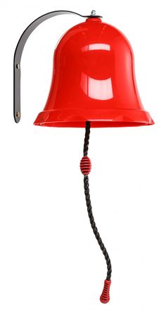 a red lamp with a black cord attached to it