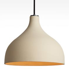 a white and yellow light hanging from a ceiling fixture with a black cord attached to it