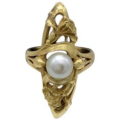 This finely modelled and extremely rare French Art Nouveau ring features two entwined irises and two flower buds surrounding a fine white oriental pearl. This elegant and harmoniously designed piece of jewellery is beautifully chiseled, solid and a tribute to the Art Nouveau movement. US ring size 7.35 Eu ring size 55.5 Art Nouveau Jewelry Ring, Antique Art Deco Jewelry, Bijoux Art Nouveau, Art Nouveau Ring, Arts Magazine, Art Nouveau Antiques, French Art Nouveau, Iris Flower, Vintage Jewelry Sets