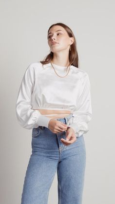 A long sleeve satin crop top blouse to dress up your look.
 • Swoon For You Satin Open Back Crop Blouse In Off White
 • 60% off for a limited time Off White Shop, Open Back Crop Top, Satin Crop Top