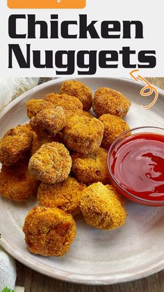 chicken nuggets on a white plate with ketchup in the middle and text overlay