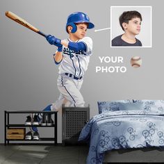 a baseball player with a bat in his hand and a photo on the wall behind him