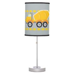 a lamp with a yellow dump truck on it