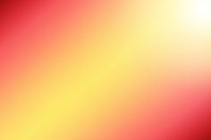 a blurry image of yellow and red colors